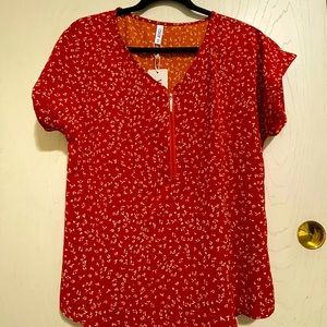 Women’s red/ orange floral blouse